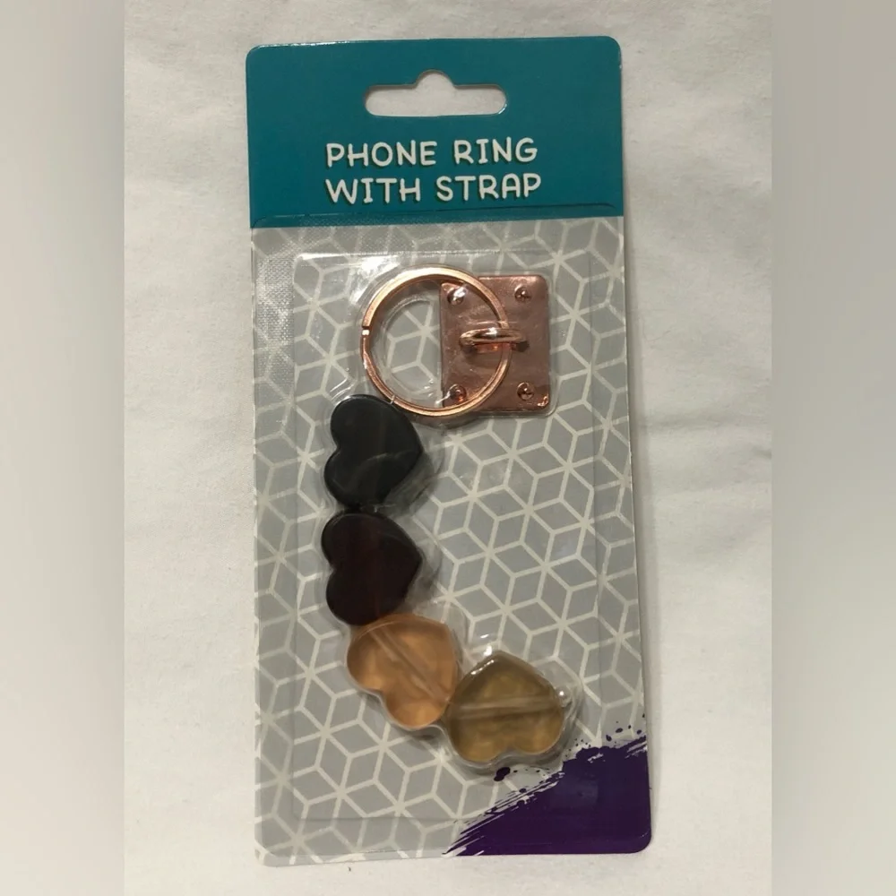 2 Pack phone rings with hearts and pom Pom charms . White/ brown